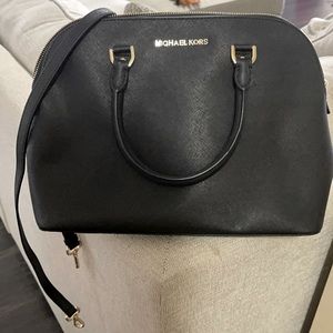 Nice Black Michael kors bag that can be carried by hand or as a cross body